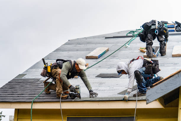 Professional Gutter Installation technician working in Creston, IA